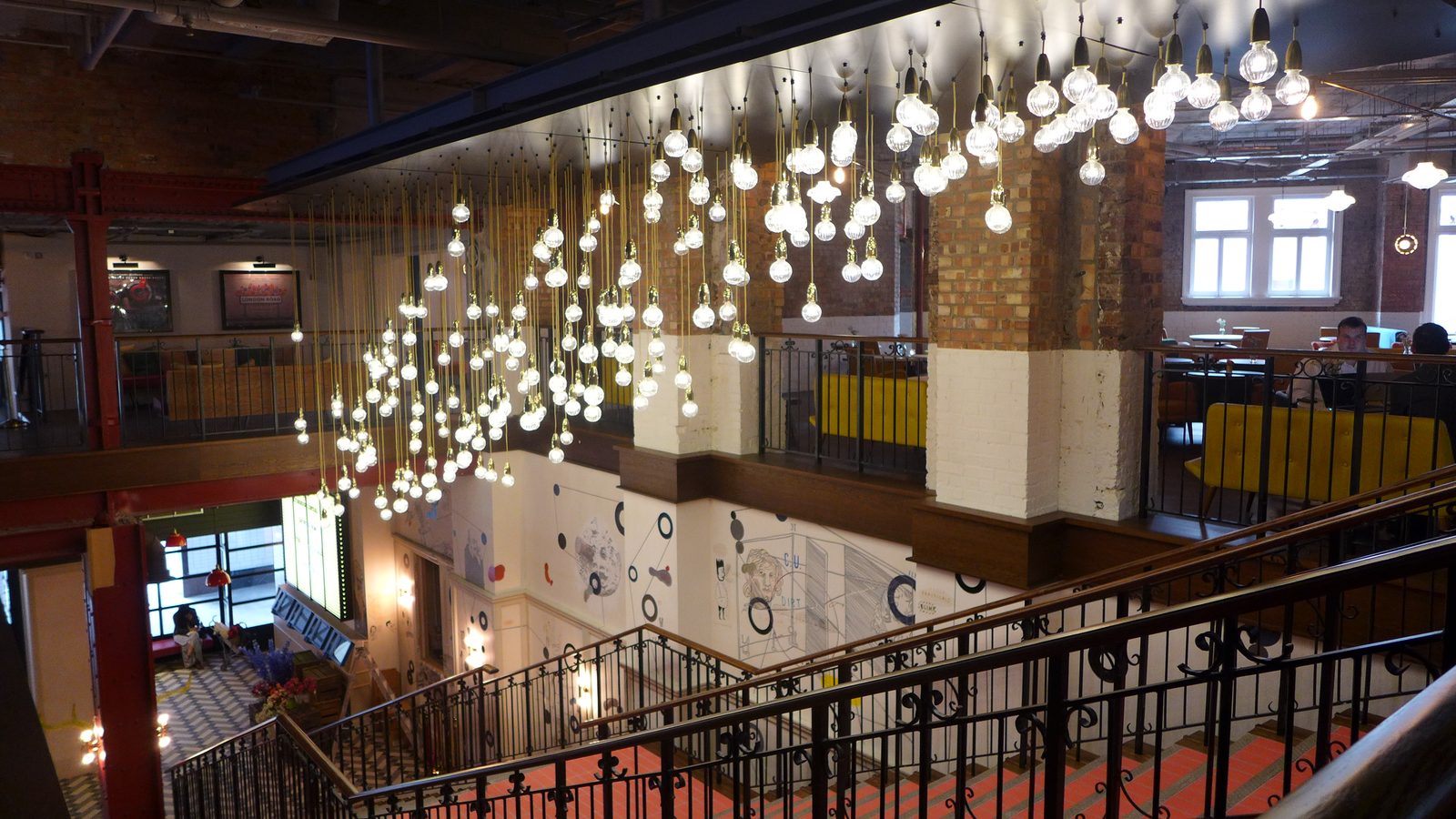 The lit staircase and bar gallery inside Picturehouse Central, near Piccadilly Circus